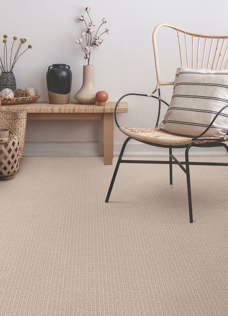 beige carpets in a Atascadero entryway with chair and bench